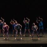 A group of ballet dancers on stage