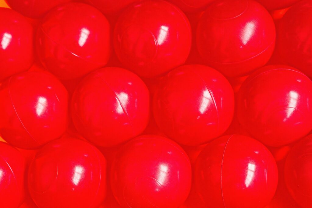 Rows of bright red, round capsules.