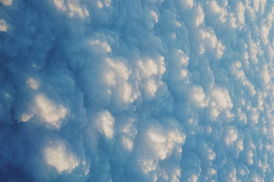 Fluffy white clouds seen from above on a clear day